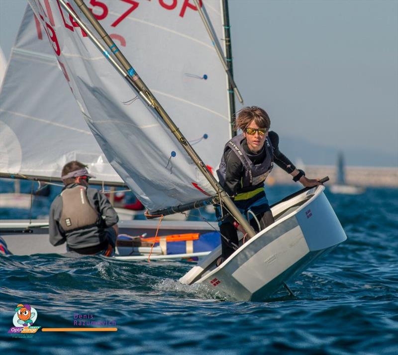 2019 OptiOrange Valencia photo copyright Denis Razumovich taken at Real Club Nautico Valencia and featuring the Optimist class