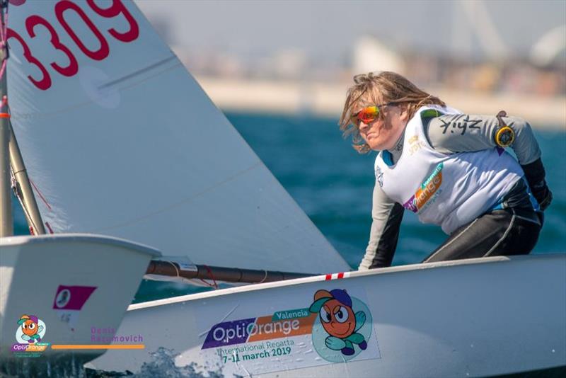 OptiOrange Valencia photo copyright Denis Razumovich taken at Real Club Nautico Valencia and featuring the Optimist class