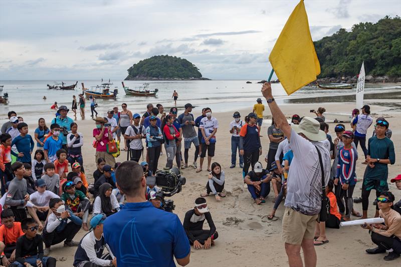 Phuket King's Cup 2022: John Doerr briefs the dinghy sailors photo copyright Guy Nowell / Phuket King's Cup taken at Phuket Yacht Club and featuring the Optimist class