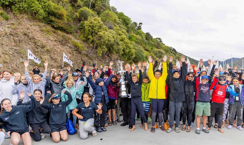 Competitors with the America's Cup at the Toyota New Zealand Optimist National Championships. Queen Charlotte Yacht Club. April 2024 - photo © Suellen Hurling