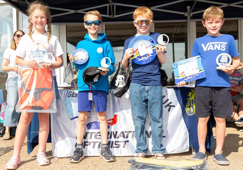 Racing Regatta fleet prizewinners - Gill Optimist Early Summer Championships at Brightlingsea photo copyright Paul Sanwell / OPP taken at Brightlingsea Sailing Club and featuring the Optimist class