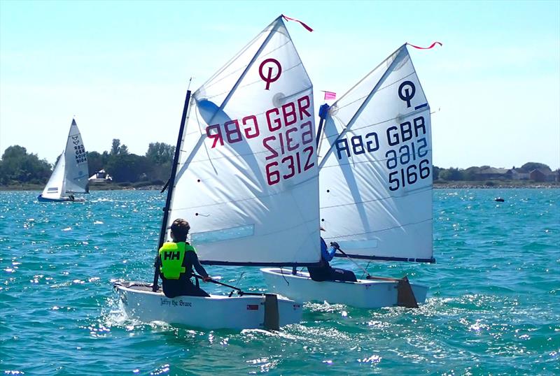 Tom Mckenna and Layla Griffiths battle it out - Optimist Red Ribbon Regatta at Hayling Island photo copyright Melvyn Cooper taken at Hayling Island Sailing Club and featuring the Optimist class