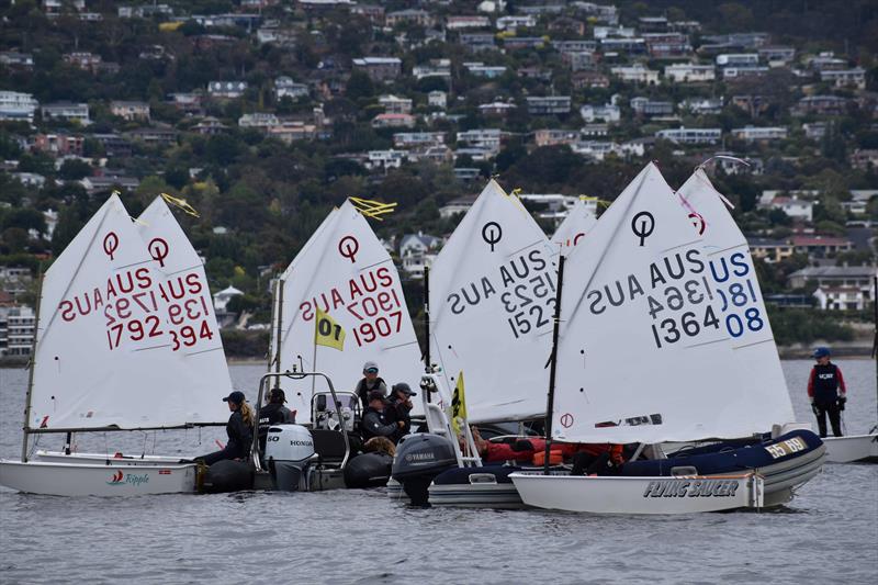 Optimist sailors waiting for the breeze with their coaches - 2026 Musto Australian Optimist Championship photo copyright Jane Austin / RYCT Media taken at Royal Yacht Club of Tasmania and featuring the Optimist class