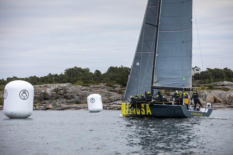 Furiosa passing the finish line in Sandhamn at 04.50 AM photo copyright Henrik Trygg taken at Royal Swedish Yacht Club and featuring the ORC class