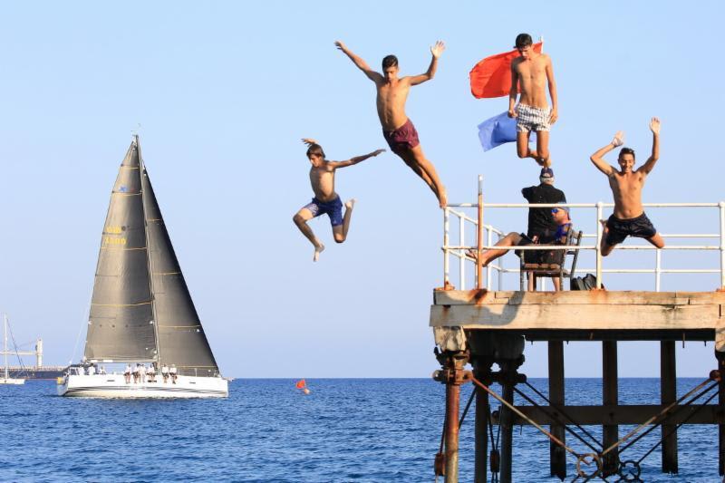 Kids keeping cool on the finish line in Limassol - 2018 ORC European Championship photo copyright Nikos Pantis taken at Famagusta Nautical Club and featuring the ORC class