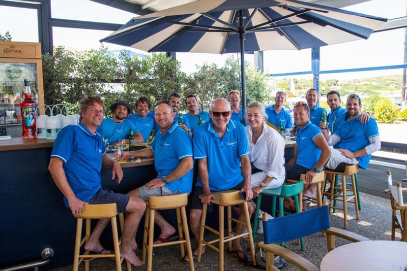 After finishing the AEGEAN 600, the LURIGNIA team enjoys refreshments at the Olympic Marina Yacht Club photo copyright Nikos Alevromytis/HORC AEGEAN 600 taken at Hellenic Offshore Racing Club and featuring the ORC class