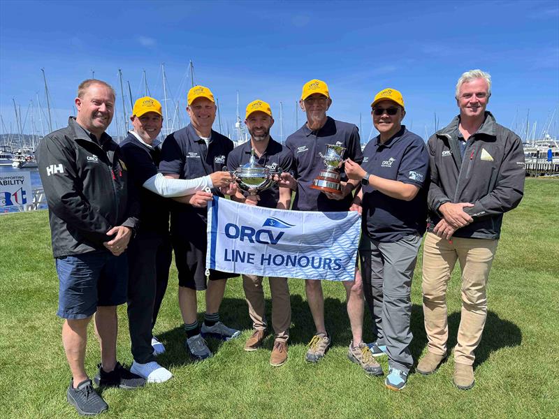 The Jackal with ORCV Race Director Ravid Schuller (L) and ORCV Commodore Cyrus Allen (R) - 2025 Melbourne to Hobart Yacht Race - photo © Jane Austin