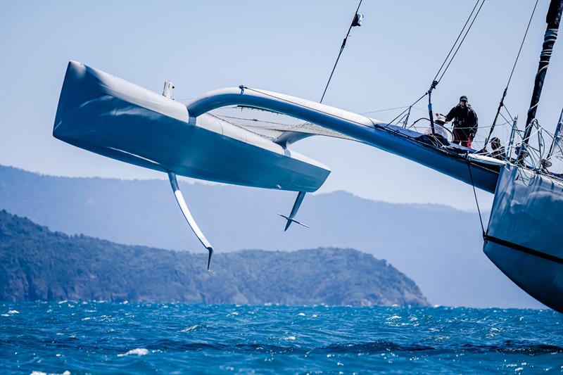 Rex flying on one hull on day 4 at 2022 Hamilton Island Race Week photo copyright Salty Dingo taken at Hamilton Island Yacht Club and featuring the ORMA 60 class