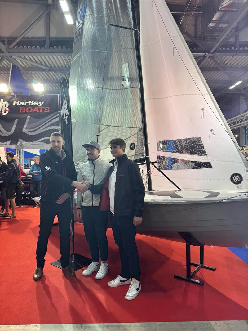 Handover of new class boat by Mark Hartley, Hartley Boats photo copyright Ros Downs taken at RYA Dinghy Show and featuring the Osprey class