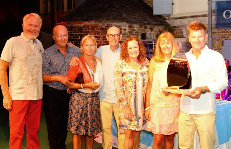 Lisanne crew at the Oyster Regatta Antigua prize giving photo copyright Kevin Johnson Photography taken at  and featuring the Oyster class