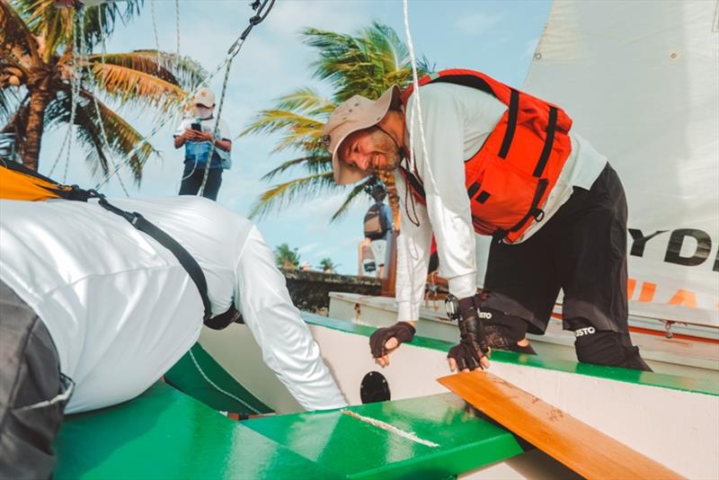 Claus getting help re-attaching his hiking strap - The Exciting Bicol Oz Goose National Championships photo copyright stolenshots photography taken at  and featuring the Oz Goose class