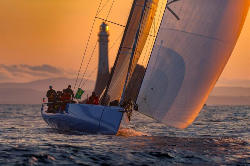 Chris Sheehan's American PAC 52 Warrior Won was an impressive sight as she rounded the Fastnet Rock at dawn in the recent Rolex Fastnet Race photo copyright Rolex / Kurt Arrigo taken at Royal Ocean Racing Club and featuring the Pac 52 class