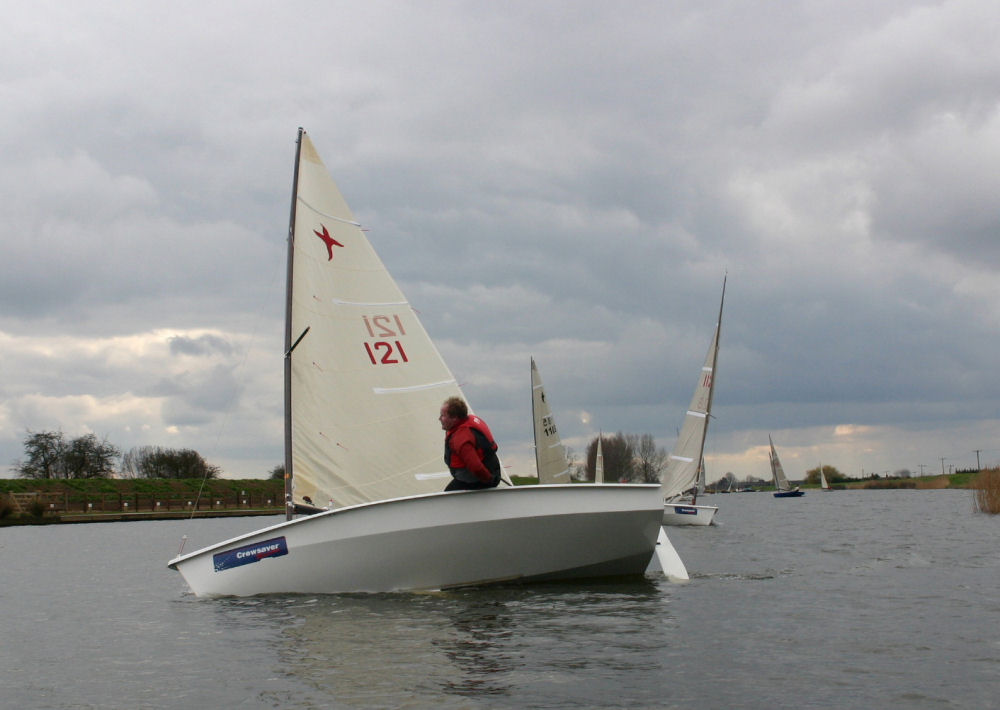 Simon Elliott on the way to his first race win at the Denver Phantom open photo copyright David Hawkins taken at Denver Sailing Club and featuring the Phantom class
