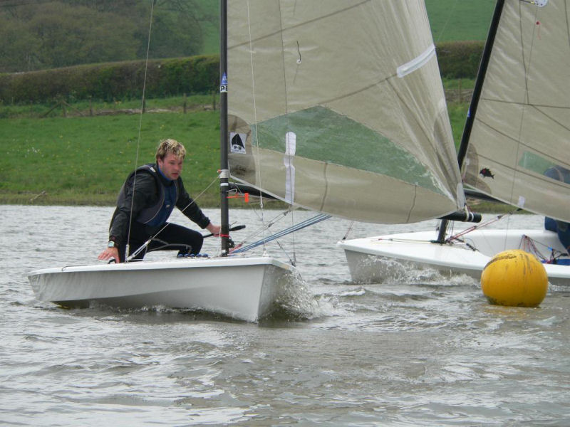 Nick Orman rounds the windward mark during the Sutton Bingham Phantom open photo copyright Bex Fraser taken at Sutton Bingham Sailing Club and featuring the Phantom class