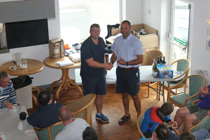 Prize giving in the Phantom Nationals at Highcliffe photo copyright Sarah Desjonqueres taken at Highcliffe Sailing Club and featuring the Phantom class