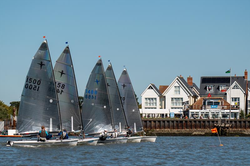 The Phantom class, a staple of the week, are starting from the BSC Line at Burnham Week 2025 photo copyright Petru Balau Sports Photography / sports.hub47.com taken at Royal Corinthian Yacht Club and featuring the Phantom class