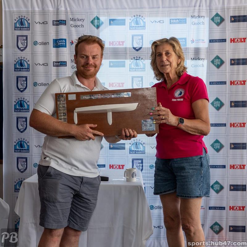 Richard Nurse wins the Phantom Half Hull trophy at Burnham Week 2025 photo copyright Petru Balau Sports Photography / sports.hub47.com taken at Royal Corinthian Yacht Club and featuring the Phantom class