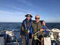 The author (left) and Erden Eruç, aboard Dark Star, somewhere off the West Coast of Vancouver Island, in June 2022 © David Schmidt Collection