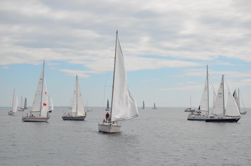 Fair skies and lights airs greet racers at the Lake Ontario 300 Challenge photo copyright Steve Singer taken at Port Credit Yacht Club and featuring the PHRF class