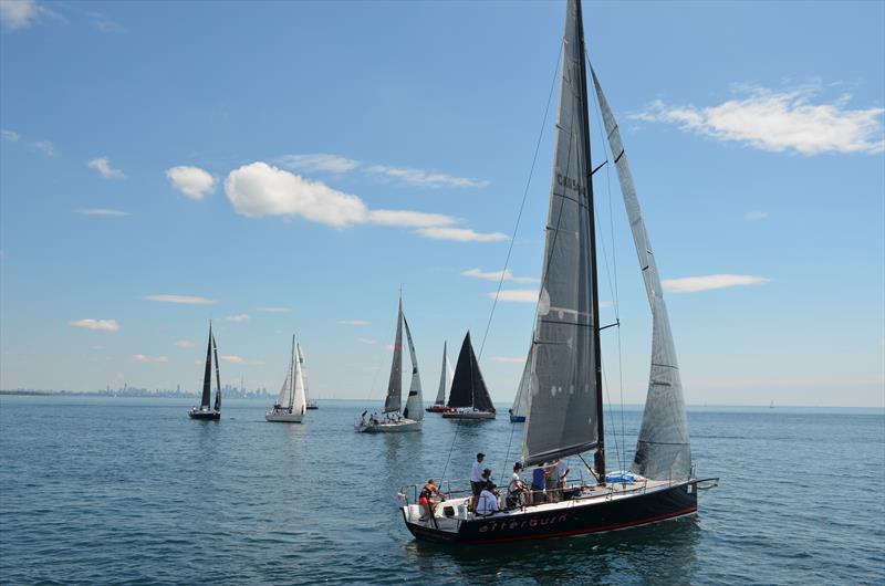 Teams negotiate light winds at the Lake Ontario 300 Challenge photo copyright Steve Singer taken at Port Credit Yacht Club and featuring the PHRF class