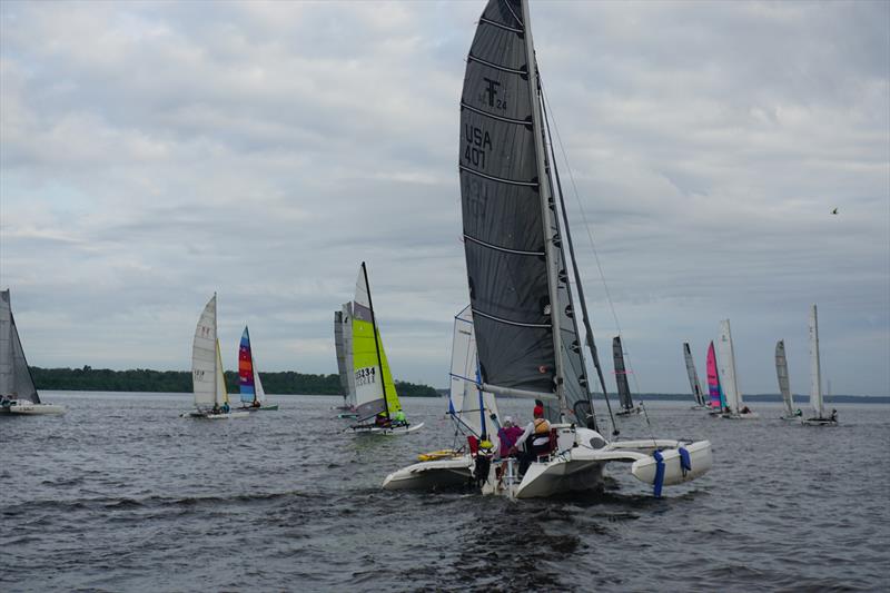 On a gray day with a rising wind, the multihulls start the 69th (2023) annual Mug Race photo copyright The Mug Race taken at The Rudder Club of Jacksonville and featuring the PHRF class