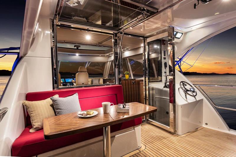 Alfresco lifestyle on the flybridge rear deck - photo © Riviera Australia