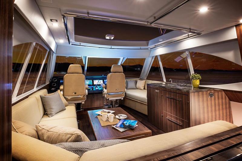 The command centre and a place to relax for guests aboard the Riviera 77 Enclosed Flybridge - photo © Riviera Australia
