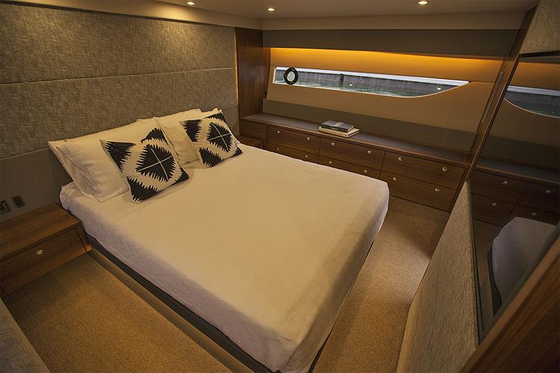 Full beam Master Stateroom amidships, with it's own head running up on the starboard side where the third cabin normally resides photo copyright John Curnow taken at  and featuring the Power boat class