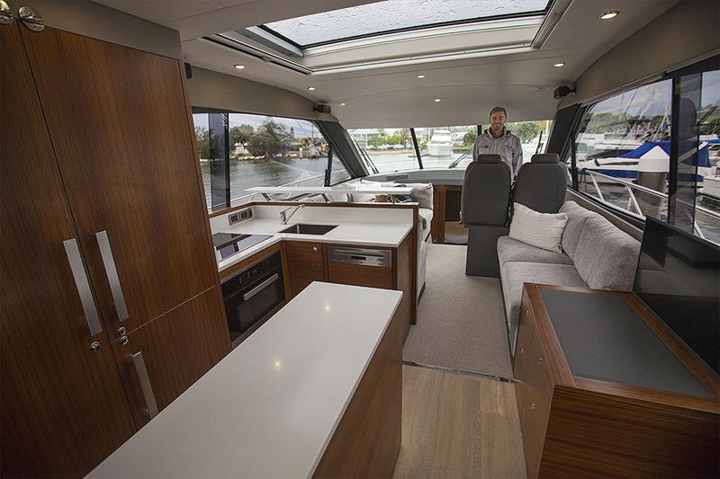 Main Saloon is spacious, light and airy with the huge Vista Windows and opening sunroof adding to it all. Galley will whip up a feast in no time, too! photo copyright John Curnow taken at  and featuring the Power boat class