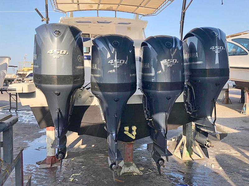 Finalising installation of the four Nizpro Marine 450s outboards on the Al Hareb Marine 56-footer. - photo © Al Murzem Trading 