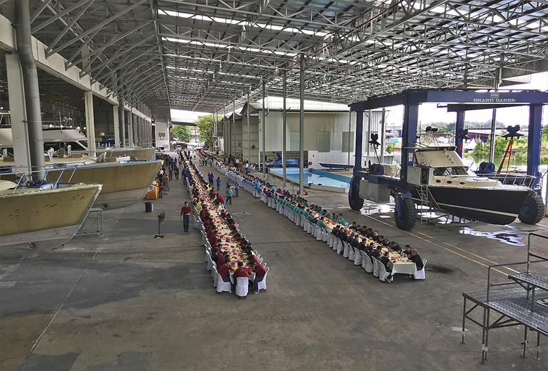 The entire Grand Banks sit down to their annual appreciation lunch at the factory photo copyright John Curnow taken at  and featuring the Power boat class