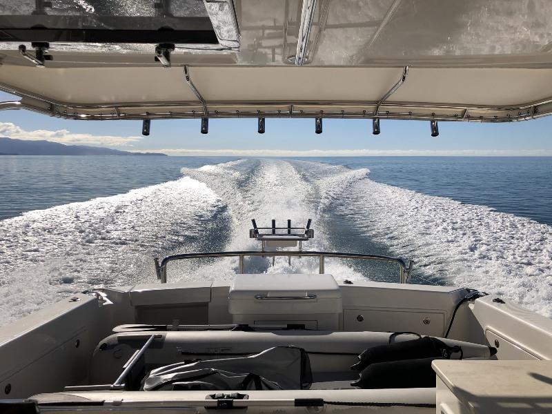 A Cook Strait crossing calm enough to water ski. - photo © Riviera Australia