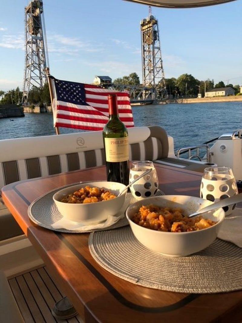 Dinner with the Welland Canal in the background, leaving Lake Erie and into Lake Ontario photo copyright Riviera Australia taken at  and featuring the Power boat class