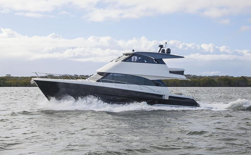 Hull#7 of Maritimo's new M55 series is off to the USA and sports this black paint job, gunwale doors, and also a pair of 1000hp donks to take her well into the mid 30s. - photo © John Curnow