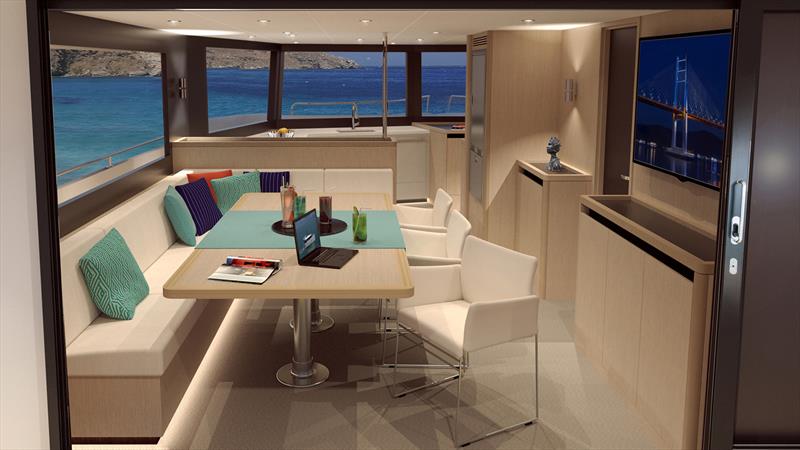 Leen 50 - The saloon's table can be set up in 2 positions–in a high position for meals (with space for 8 people) and a low position for a living-room feel photo copyright LEEN-Trimarans taken at  and featuring the Power boat class