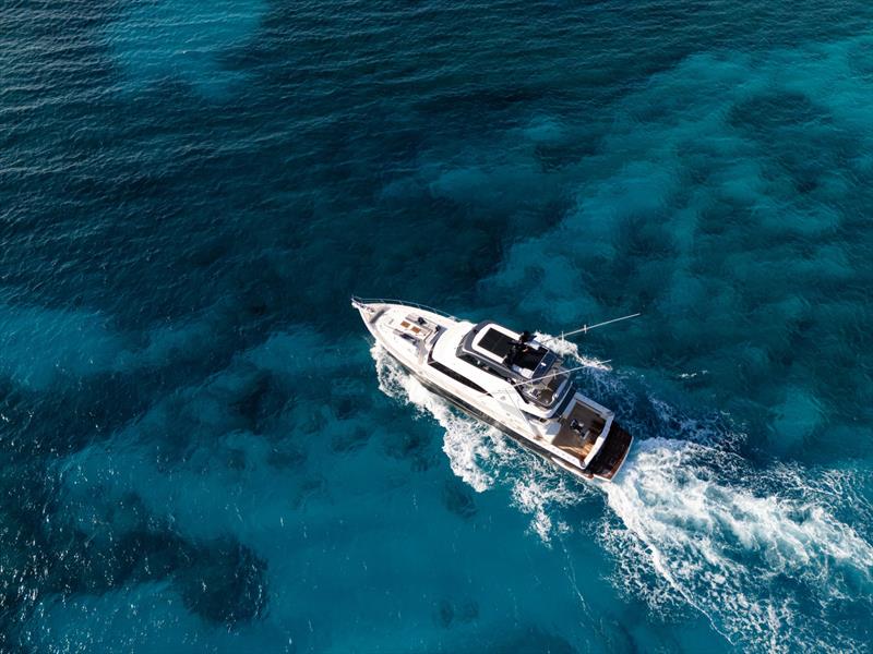 Our cruise towards the îlot was accompanied by playful dolphins photo copyright Riviera Australia taken at  and featuring the Power boat class