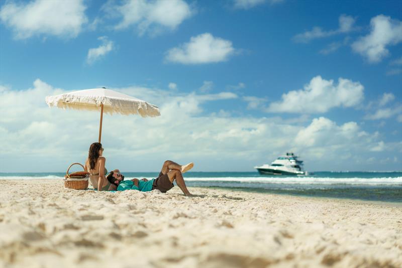 A leisurely picnic on the sandbank of Îlot Flamants off the south-east coast of Mauritius photo copyright Riviera Australia taken at  and featuring the Power boat class