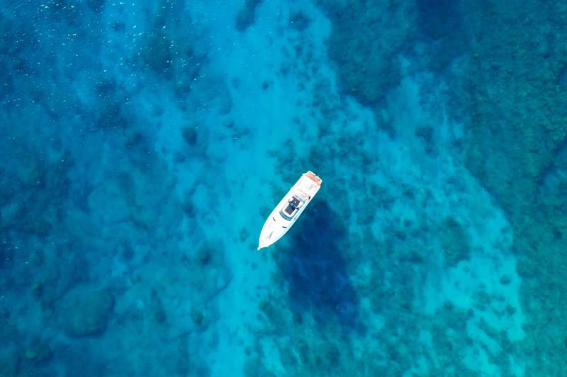 Fishing near the Albion Cliffs, offering stunning views of dramatic rock formations photo copyright Riviera Australia taken at  and featuring the Power boat class