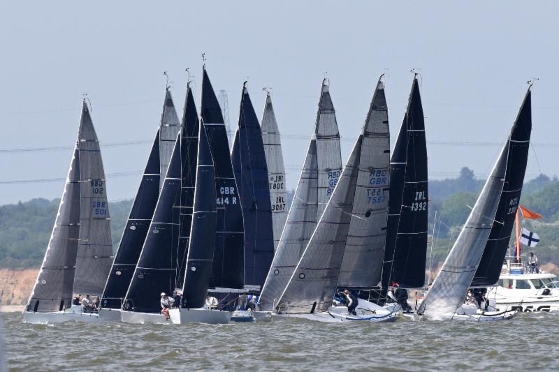 Start of race 1 for the Quarter Tonners where Catrina Southworth's Whiskers leads the fleet - 2018 Vice Admiral's Cup photo copyright Rick Tomlinson taken at Royal Ocean Racing Club and featuring the Quarter Tonner class