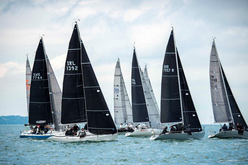 Close racing on the solent during the final day of the Quarter Ton Cup photo copyright Waterline Media taken at  and featuring the Quarter Tonner class