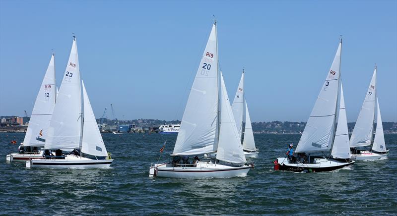 R19 fleet upwind on Sunday at the International Paint Poole Regatta 2026 photo copyright Mark Jardine taken at Parkstone Yacht Club and featuring the R19 class