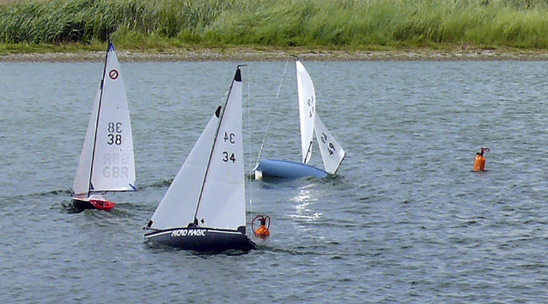 The top three boats overall head around the windward in race 6 of the Micro Magic nationals photo copyright Micro Magic class taken at Southwold Sailing Club and featuring the Radio Sailing class