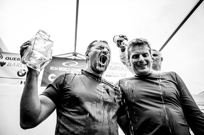Vladimir Prosikhin and tactician Dean Barker drenched in celebratory champagne at the RC44 Cascais Cup - photo © Pedro Martinez / Martinez Studio