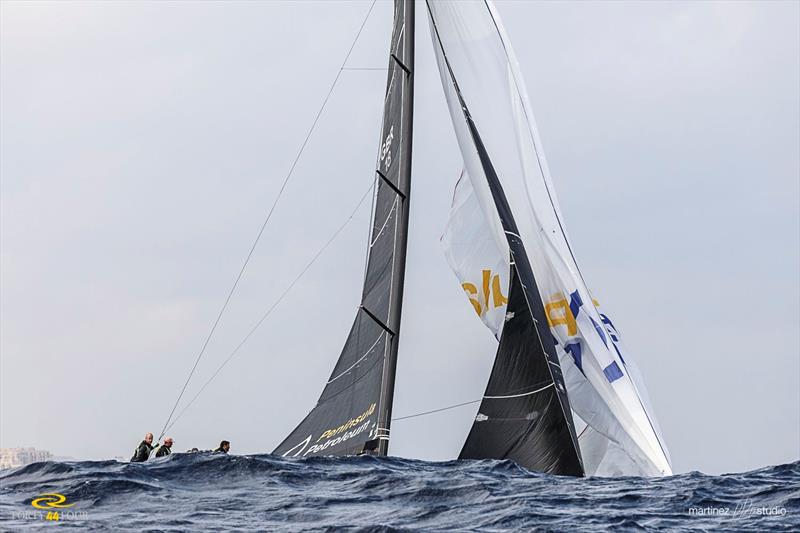 Peninsula Petroleum disappear behind the rolling swell on day 1 of the RC44 Valletta Cup fleet racing - photo © Nico Martinez / www.MartinezStudio.es