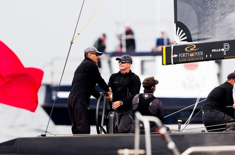 Team Nika's owner Vladimir Prosikhin and tactician Terry Hutchinson shake hands after another race win on day 3 of the RC44 Marstrand World Championship photo copyright Pedro Martinez / Martinez Studio taken at  and featuring the RC44 class