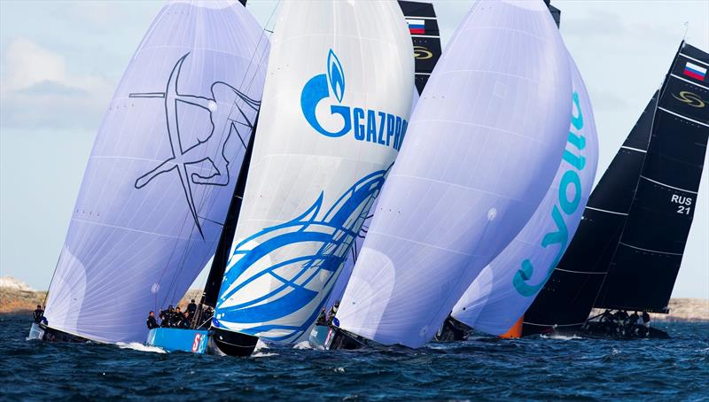 The fleet is nose to tail around the windward mark at the RC44 Marstrand World Championship - photo © Pedro Martinez / Martinez Studio