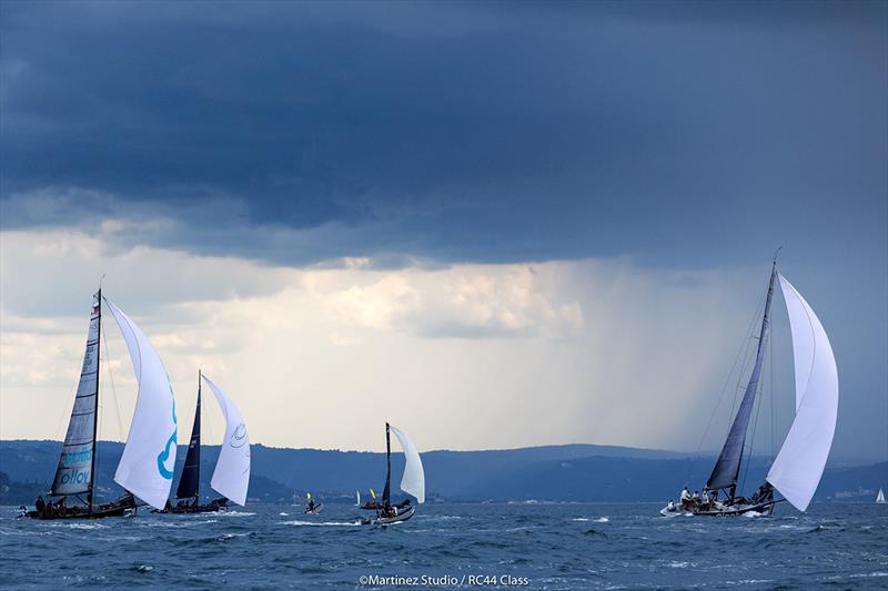 A big rain cloud affected raining all day and brought thunder and lightning to the mainland - 2018 RC44 Portorož Cup - Day 2 photo copyright Nico Martinez / www.MartinezStudio.es taken at Yacht Club Marina Portorož and featuring the RC44 class