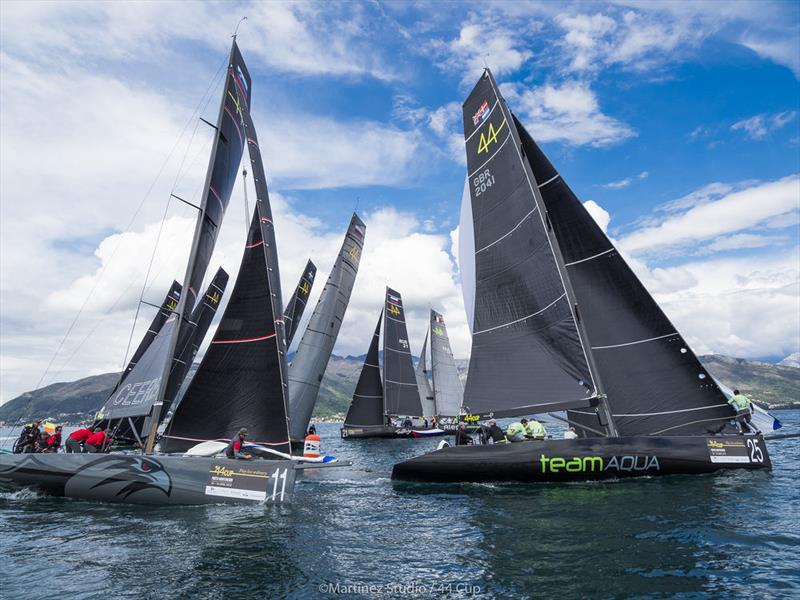 Team Aqua leads Team CEEREF on to the run in today's first race - 44Cup Porto Montenegro  photo copyright MartinezStudio.es taken at Porto Montenegro Yacht Club and featuring the RC44 class