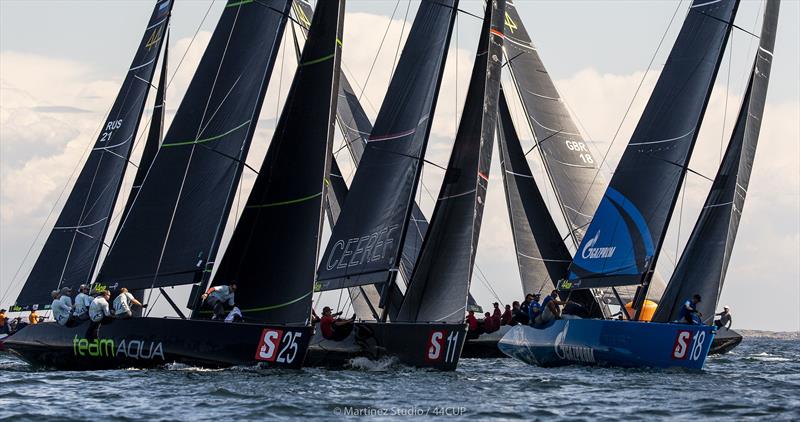 Team Aqua, CEEREF and Bronenosec Sailing Team stacked up coming into the top mark in today's first race - 44Cup World Championship - photo © Pedro Martinez / Martinez Studio