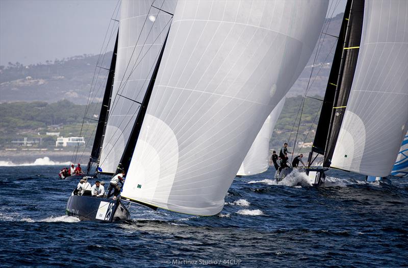 In race two Team Aqua performed a top mark 'buffalo girls' manoeuvre on Team Nika pulling them into the lead - 44Cup Cascais photo copyright Pedro Martinez / Martinez Studio taken at Porto Montenegro Yacht Club and featuring the RC44 class